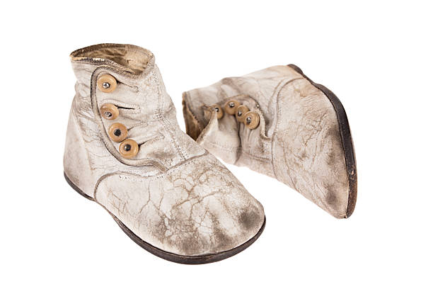 istock Vintage baby boots isolated on whtie 135848147