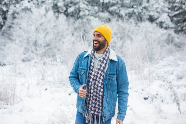 istock The bearded man enjoys the winter magic 1358482523