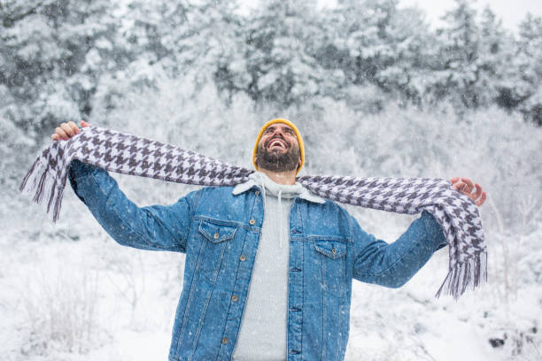 istock The bearded man enjoys the winter magic 1358482547