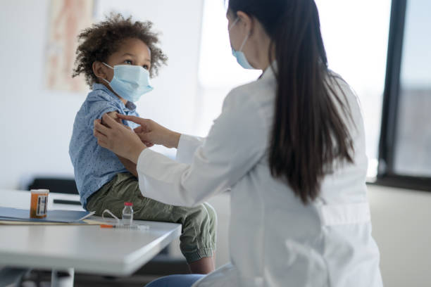 istock Getting a Bandage After a Vaccine 1358496309