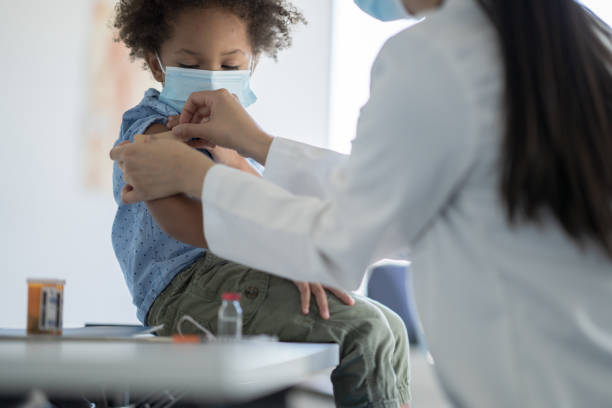 istock Getting a Bandage After a Vaccine 1358496317