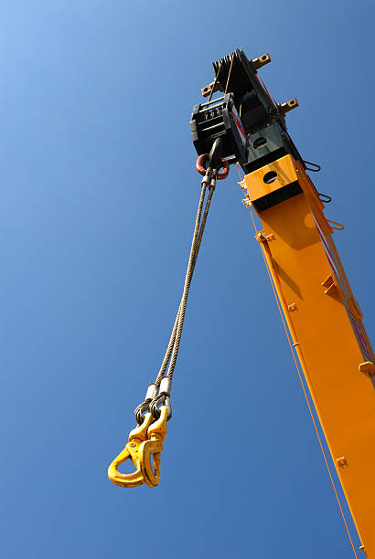 istock Crane detail with winch and hookes 135849661