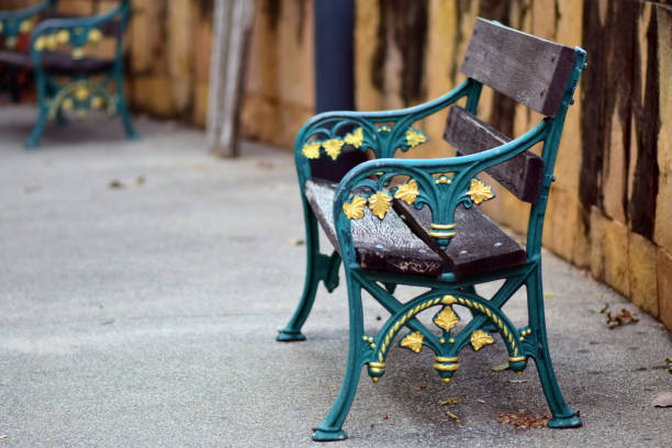 istock An old green bench in the park. 1358502743