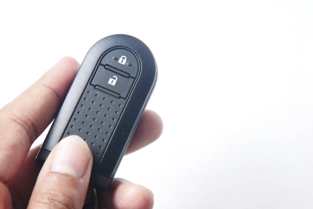 istock close up of car key on white background , 1358503616