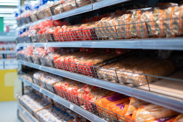fresh bread on the shelf in the food and grocery store stock photo