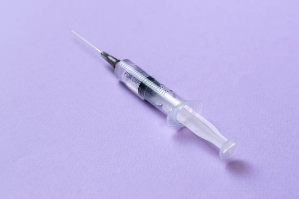 istock view from above simple medicine syringe, minimalistic style 1358508343
