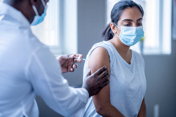 istock Woman Receiving Her Vaccine 1358510225