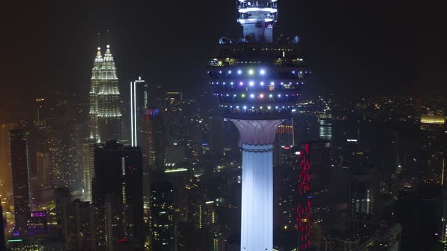 Aerial cityscape with Kuala Lumpur Tower at night