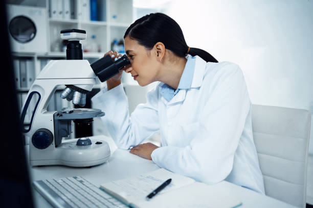 istock Shot of a young scientist using a microscope in a laboratory 1358514402