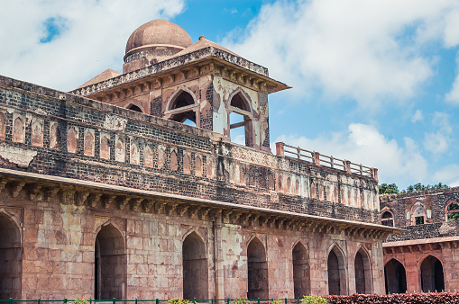 Lalbagh Fort in Dhaka, Bangladesh. This is the tomb of Bibi Pari in the grounds of Lalbagh Fort. To the left with three domes is Lalbagh Fort Mosque.