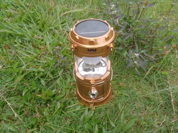 istock gold coloured solar LED lamp 1358527267