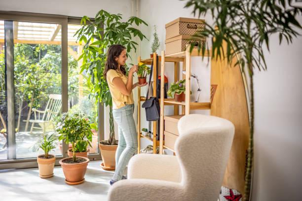 istock Woman arranging a new apartmen 1358531507