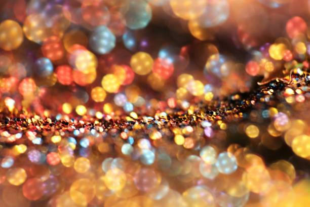 istock glitter texture. Shiny Festive Background.Christmas background. Glowing bokeh. Abstract background with bokeh and light.Shining bokeh background. soft focus.Beautiful bokeh 1358533149