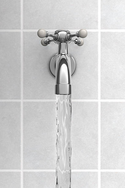 istock Water Tap made of chrome on tiles 135853614