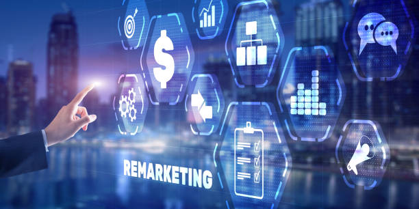 Remarketing digital marketing concept. Businessman presses remarketing on virtual screen stock photo