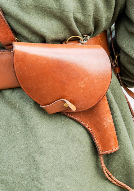 Vintage leather holster on the belt