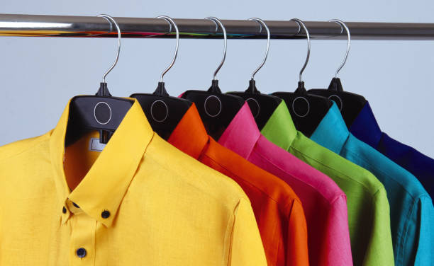 istock colorful shirts on hangers. 1358541512