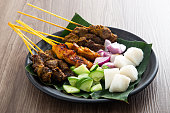 3-verschiedene-arten-von-malaysischem-satay-huhn-rind-und-hammelfleisch-satay.jpg?b=1&s=170x170&k=20&c=XpEW77OXsSz3l6xWphK4zw9vVV9KWgD8ONVSFPlZz5c=