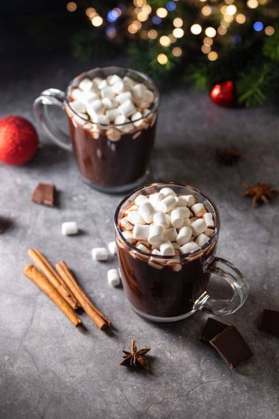 istock Glass mug with hot chocolate cocoa drink with marshmallow. Copy space. Dark background. Low key. Winter, Christmas and New Year food and drink concept. Selective focus. 1358546307