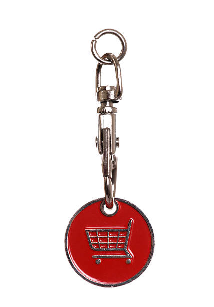 shopping trolley token shopping trolley token on white background token photos stock pictures, royalty-free photos & images