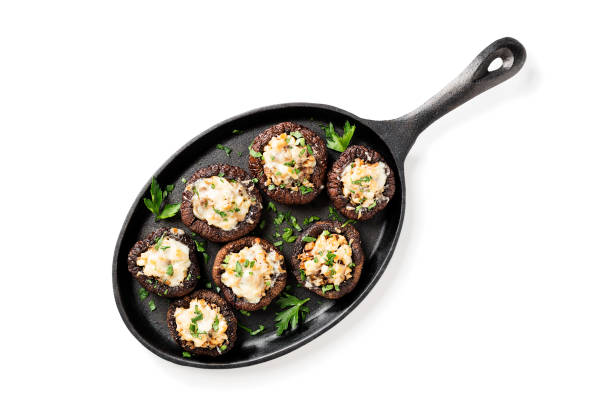 istock Baked mushroom caps stuffed with chicken meat 1358549196