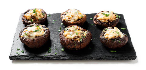 istock Baked mushroom caps stuffed with chicken meat 1358549197