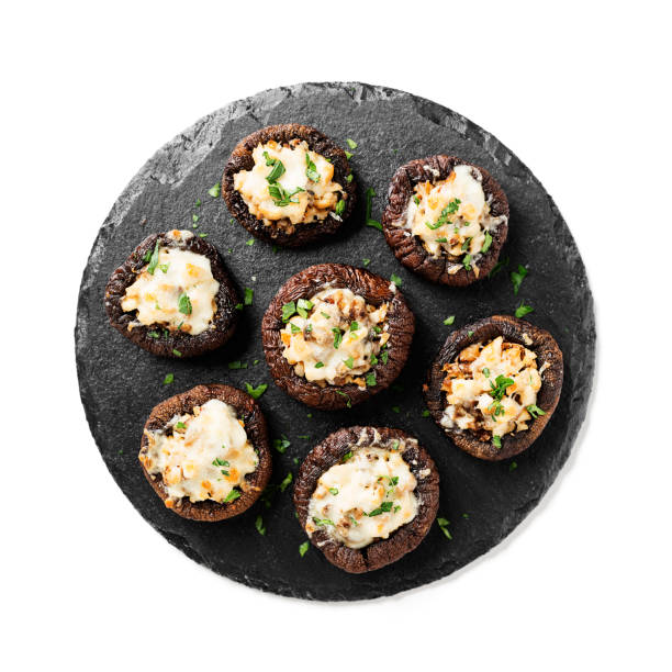 istock Baked mushroom caps stuffed with chicken meat 1358549198