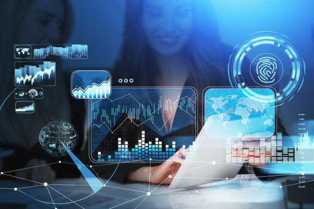 istock Business people with tablet in hands, graphs and data digital hud 1358549203