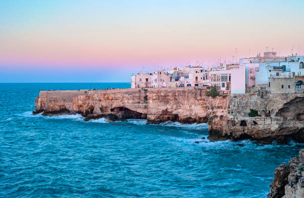 istock Polignano a Mare cliff landscape, rocks and sea 1358550228