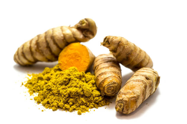 istock Turmeric and turmeric powder isolated on white background 1358556289