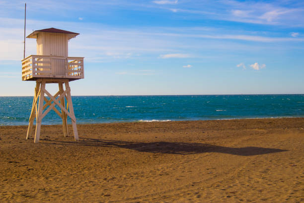 istock View of lifeguard hut at beach against sky 1358556545