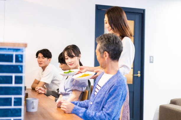 istock Customers eating lunch at a popular cafe restaurant 1358559530