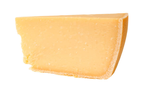 istock Piece of parmesan cheese isolated on white. Ready for clipping path. 1358561726