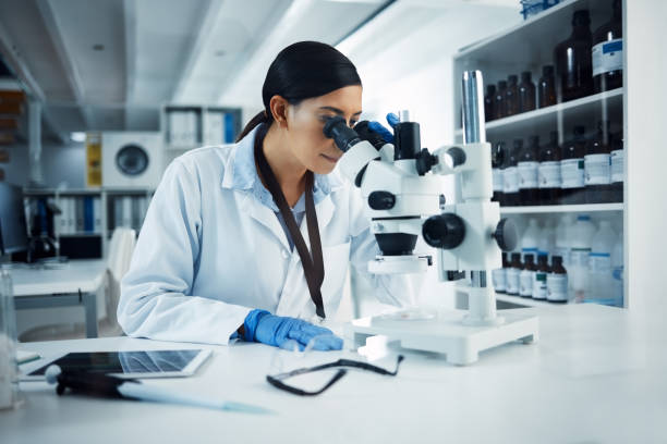 istock Shot of a young scientist using a microscope in a laboratory 1358566591