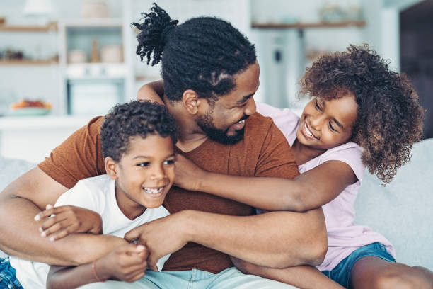istock Father playing with his children 1358566631