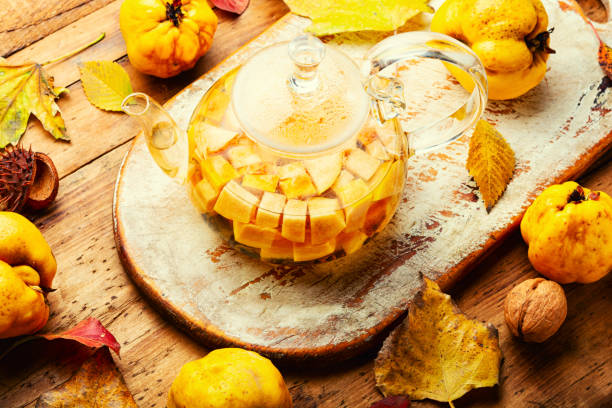 Autumn tea with quince stock photo