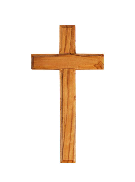 istock Wooden crucifix standing on white background. 1358566992