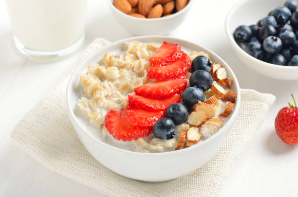 istock Porridge with strawberry, blueberries and nuts 1358567003