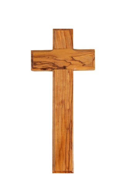 istock Wooden crucifix standing on white background. 1358567057