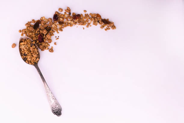 Spoon with homemade granola. Copy space.