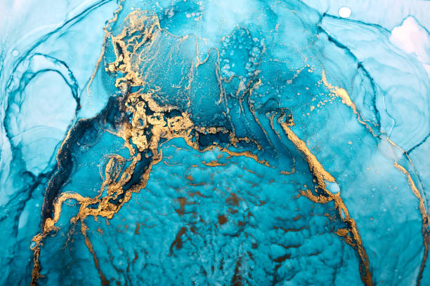 Luxury emerald abstract background in alcohol ink technique, aquamarine gold liquid painting, scattered acrylic blobs and swirling stains, blue green printed materials Luxury emerald abstract background in alcohol ink technique, aquamarine gold liquid painting, scattered acrylic blobs and swirling stains, blue green printed materials precious gemstone stock pictures, royalty-free photos & images