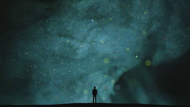 istock The human silhouette standing on a dark cloudy background 1358577187