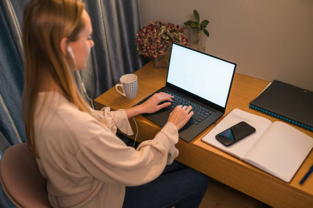 istock Young Woman Studying Online With Laptop 1358579814