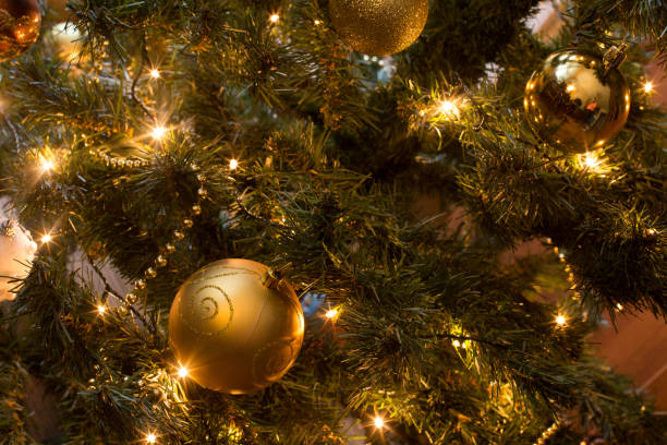istock Christmas tree with lights and decorations with soft focus 1358580776
