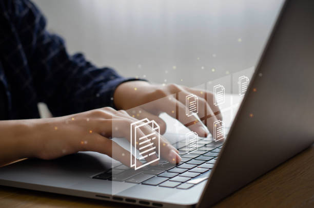istock business man who uses a computer to manage documents document management concept digital document online document database and digital file storage systems, record-keeping software database technology 1358583970