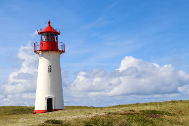 istock Red and White lighthouse in Sylt Germany 1358585017