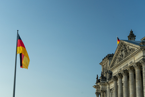 BERLIN, GERMANY May 14, 2020. 
The famous Bundestag Reichstag building in Berlin with the german flag.