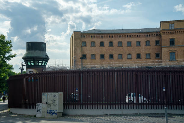 The Prison in Berlin Germany Moabit BERLIN, GERMANY May 27, 2020. The entrance of the Moabit prison correctional facility in the district of Berlin's Mitte. moabit stock pictures, royalty-free photos & images