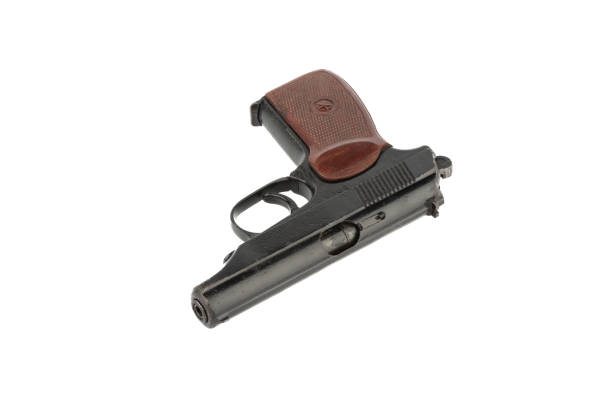 Old used Makarov pistol isolated on white background. Copy space.