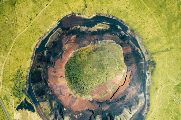 Aerial View of Prairie and Extinct Volcanic Crater Aerial View of Prairie and Extinct Volcanic Crater, China extinct volcano stock pictures, royalty-free photos & images